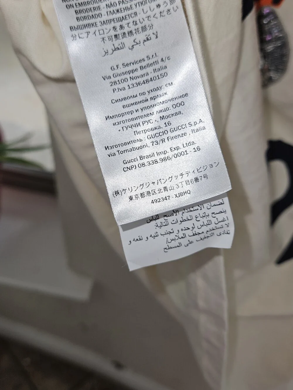 Gucci Cream Tee with Bold Orange Tiger Graphic